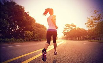 Cardio training, such as running, helps burn fat in the legs. 